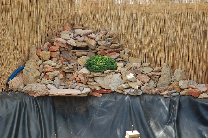 Completed waterfall, hooking up water.jpg